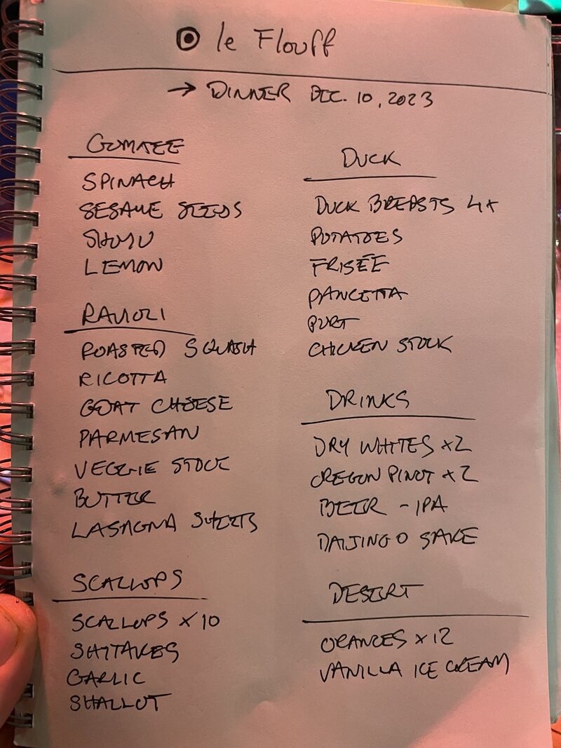 A handwritten menu on a notepad titled 'le Fluff' with sections for dinner ingredients, duck dishes, drinks, and dessert, dated December 10, 2023.